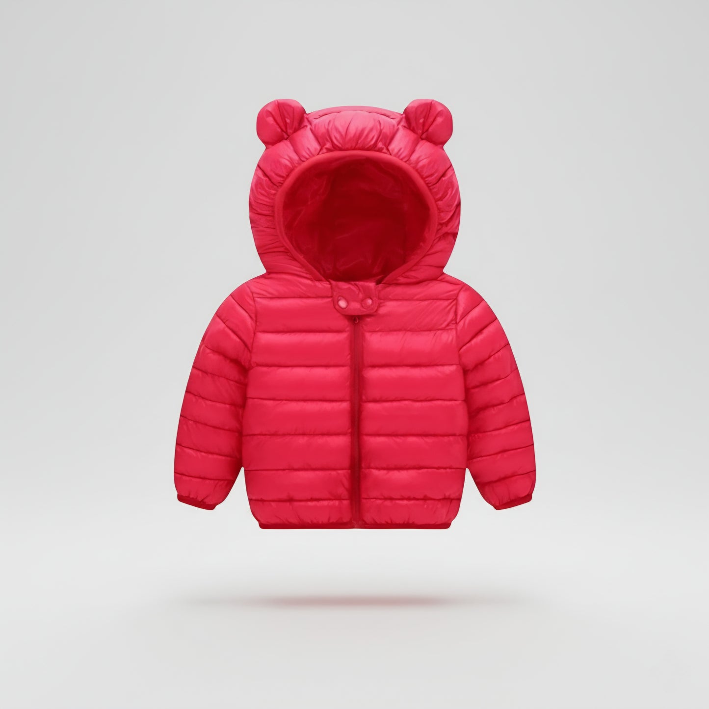 Red puffer jacket with bear ears on a light gray background