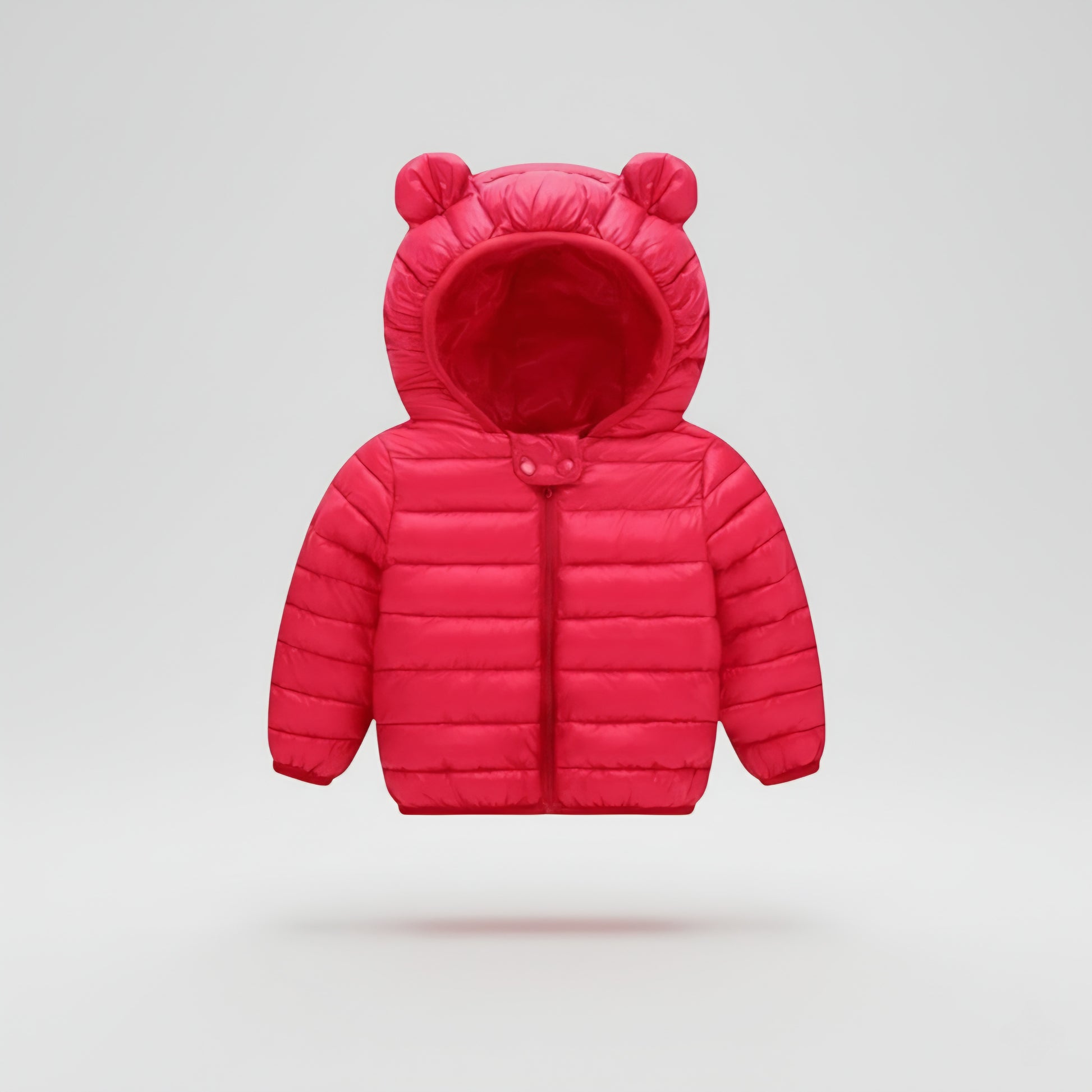 Red puffer jacket with bear ears on a light gray background