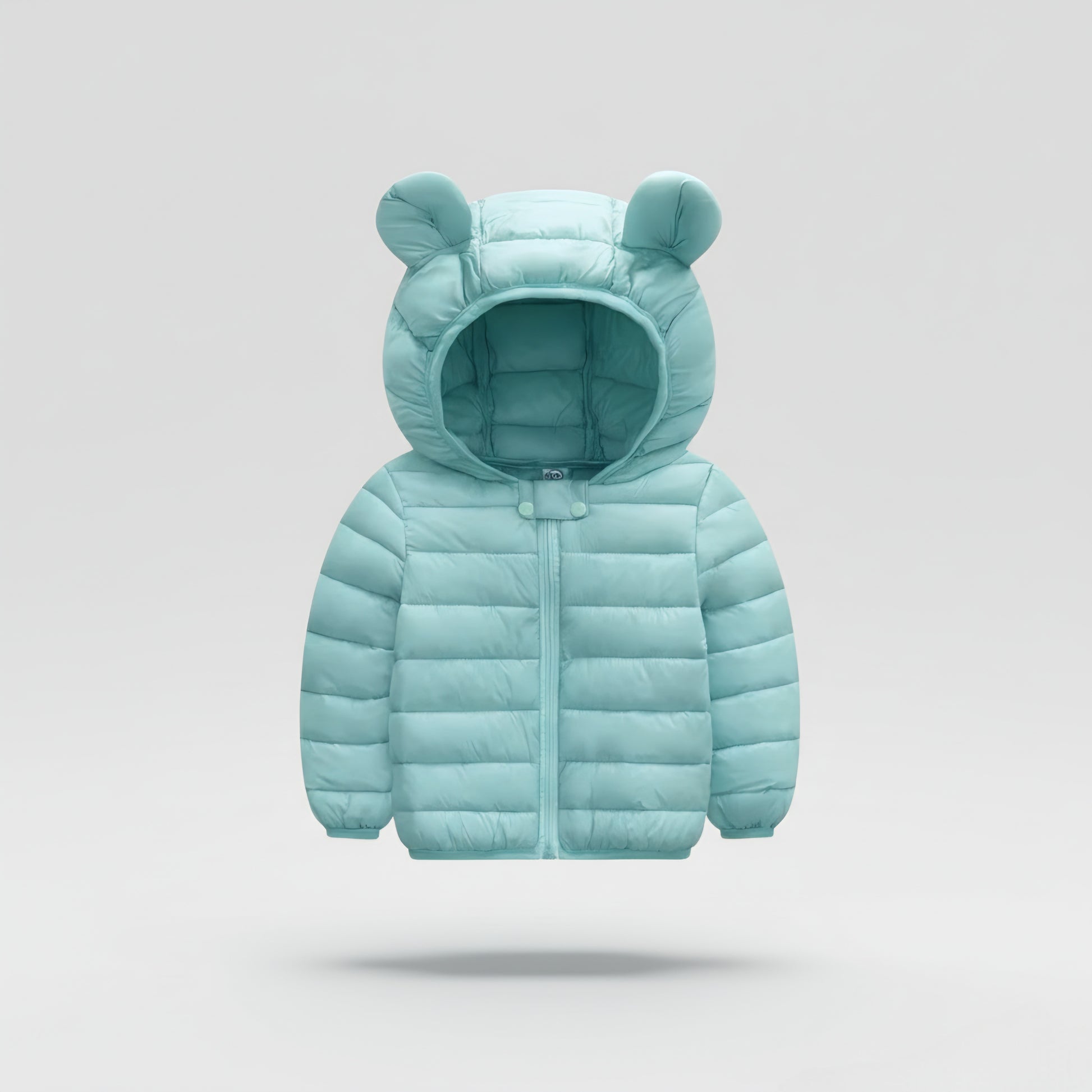 Light blue puffer jacket with bear ears on a gray background