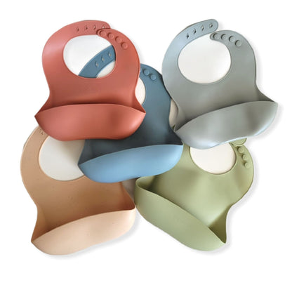 five silicone baby bibs in solid colors | hunny bubba kids