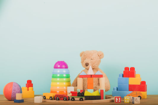Wooden Montessori toys and stacking toys for babies on a table 