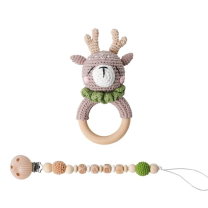 Deer crochet rattle and wooden personalized pacifier clip set on a white background