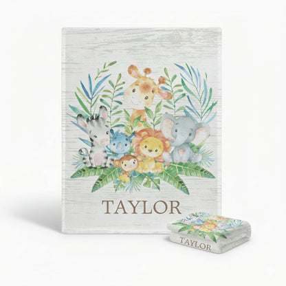 Children's book with animal illustrations and a matching blanket on a white background