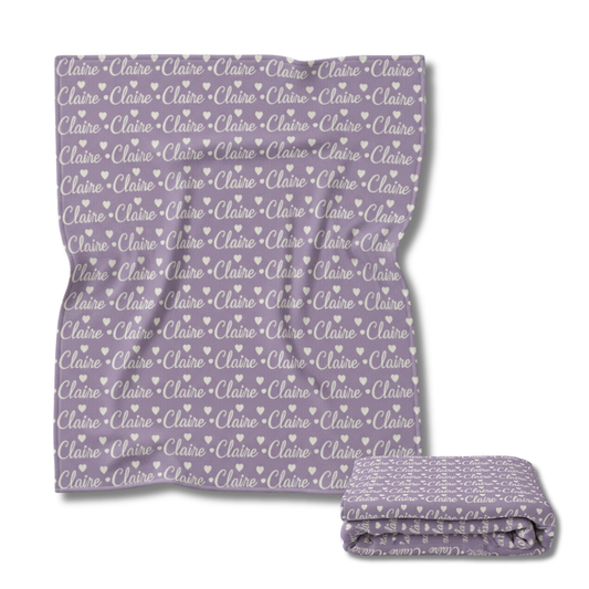 Lilac blanket with 'Claire' pattern on a white background