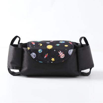 black stroller caddy  and cup holder with space themed graphics on a white background