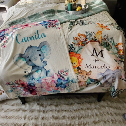 Baby blankets, Baby fleece blankets laying on a bed in a bedroom 