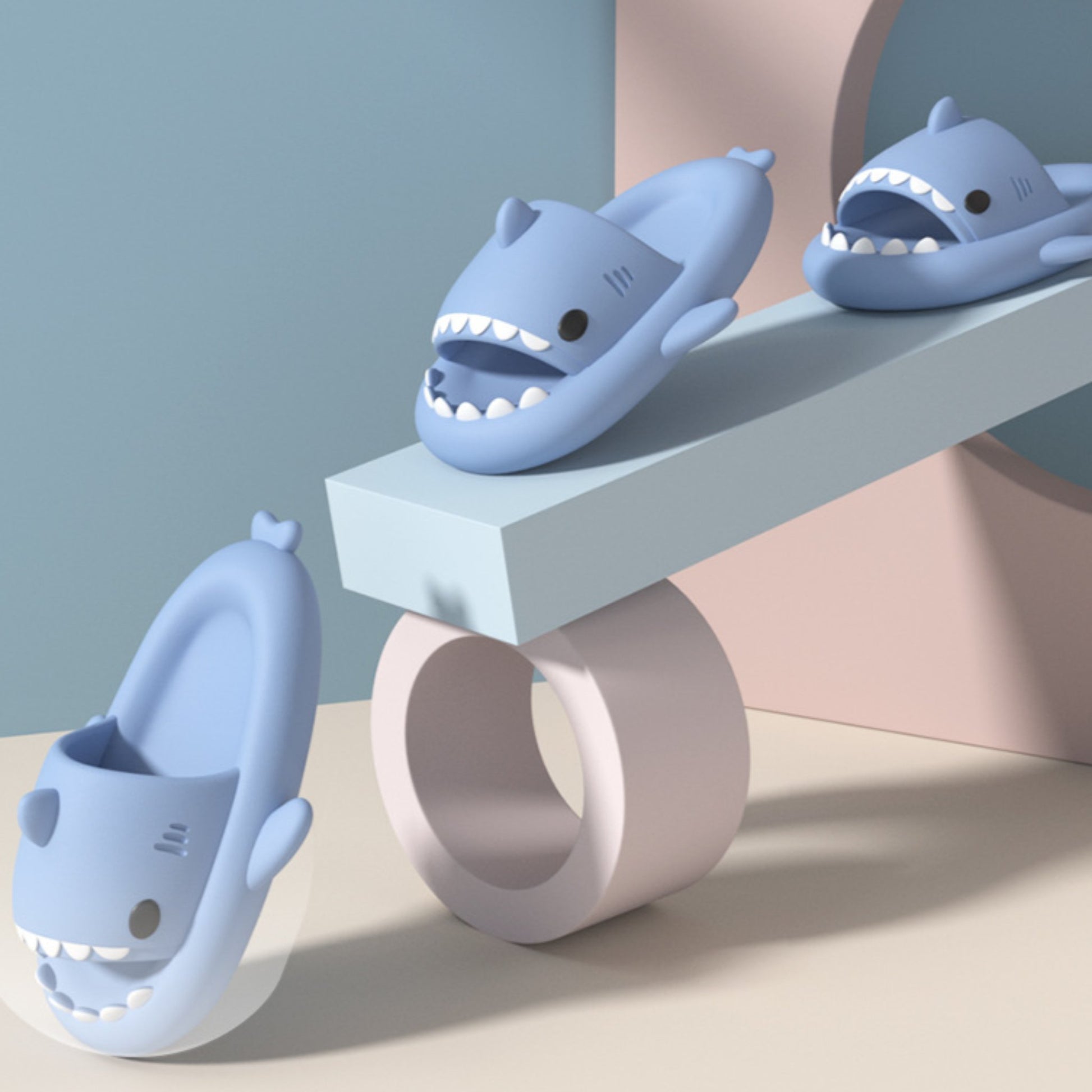 Three light blue Kids Summer Shark Slippers on a ramp - Hunny Bubba Kids