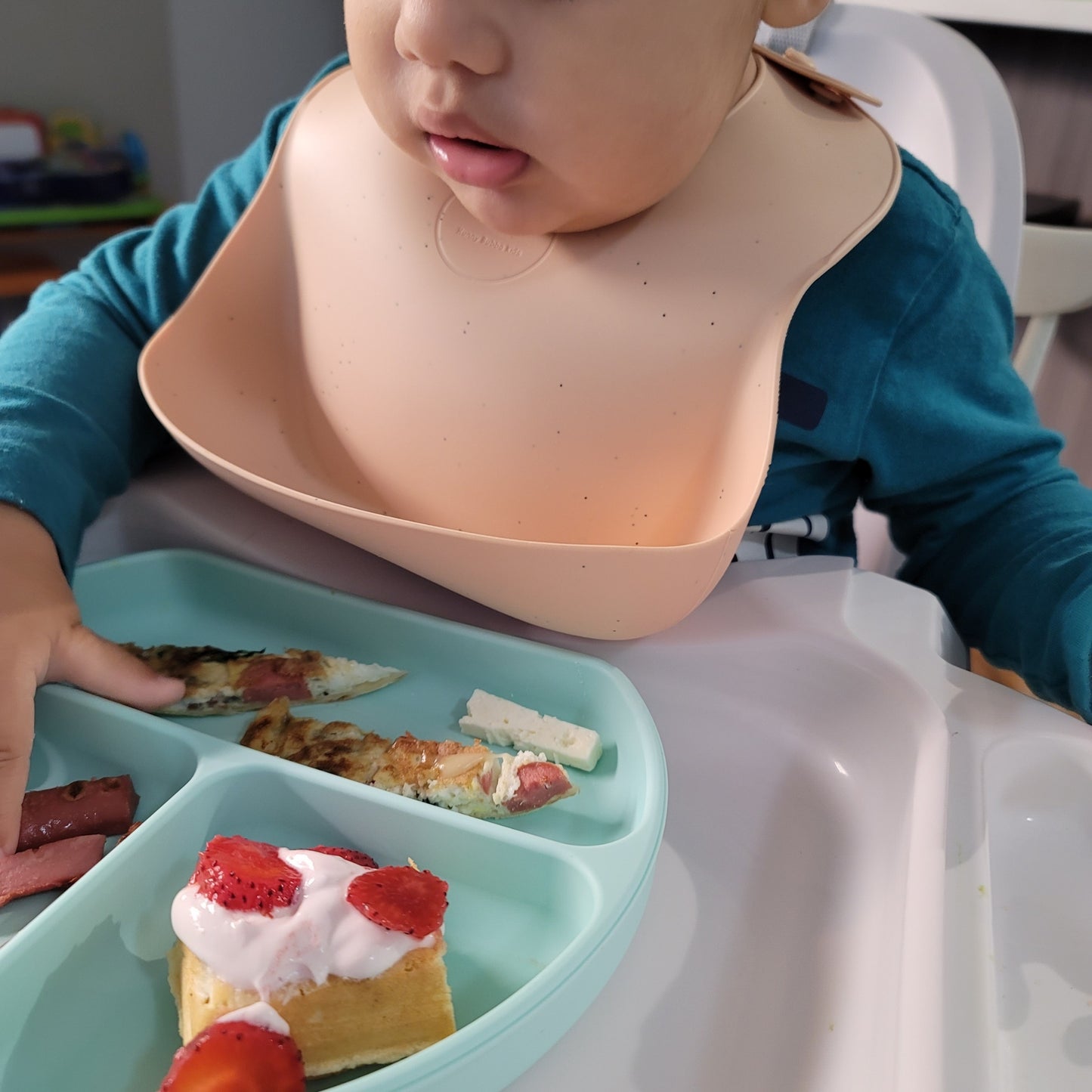 Baby wearing a slicone baby bib| baby bib for meal time | hunny bubba kids baby silicone bib