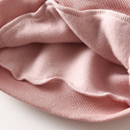 Close up of pink pullover hoodie from a tracksuit for kids and toddlers