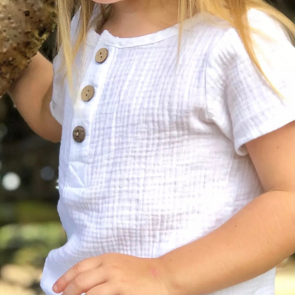 baby girl using soft white summer shirt with buttons