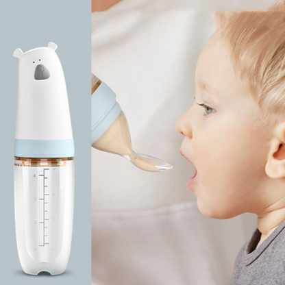 baby being fed by mom with a silicone self feeding spoon BLW - hunny bubba kids