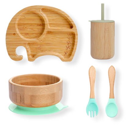 Green elephant bamboo plate and dinnerware set for toddlers on white background