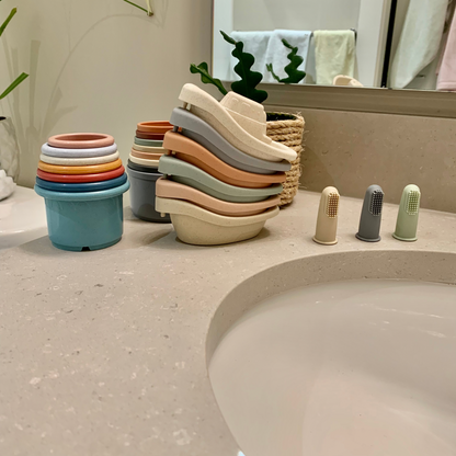 stacking amd nesting cups and boats for kids in the bathroom - hunny Bubba Kids