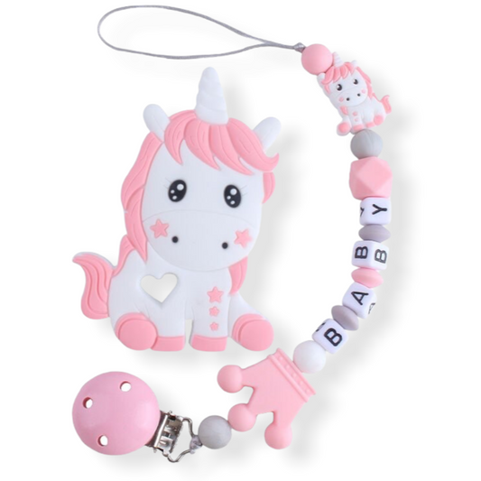 personalized pink unicorn pacifier clip with unicorn teether on white background
