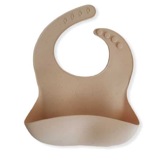 beige silicone bib for babies on white background